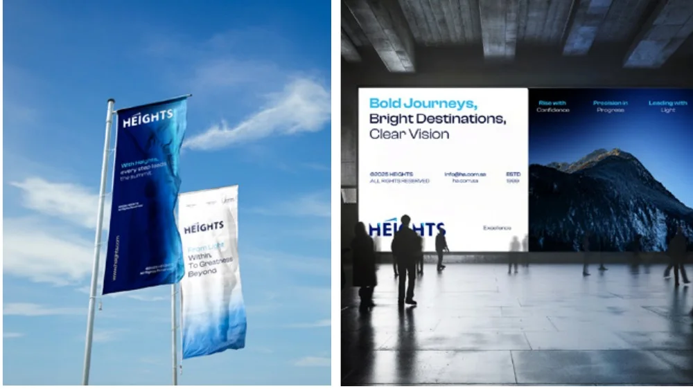 Heights flags and exhibition screen Heights event company branded flags and a large exhibition screen reading Bold Journeys, Bright Destinations, Clear Vision
