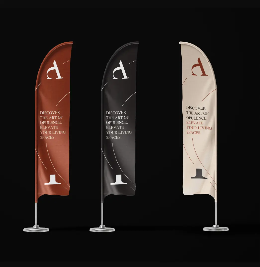 Three Arc de Sol feather flags in warm red, black and stone with the letter mark