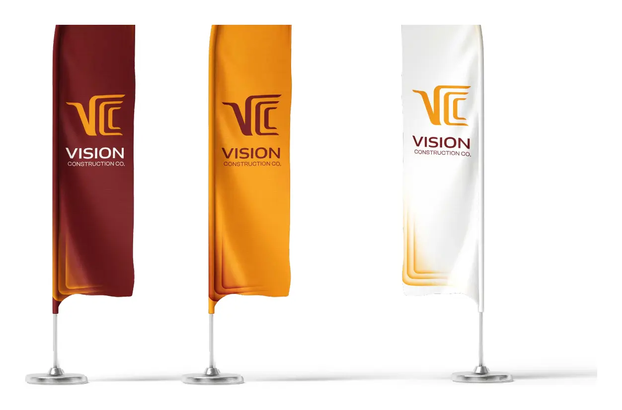 Three VCC feather flags in dark red, golden yellow and white