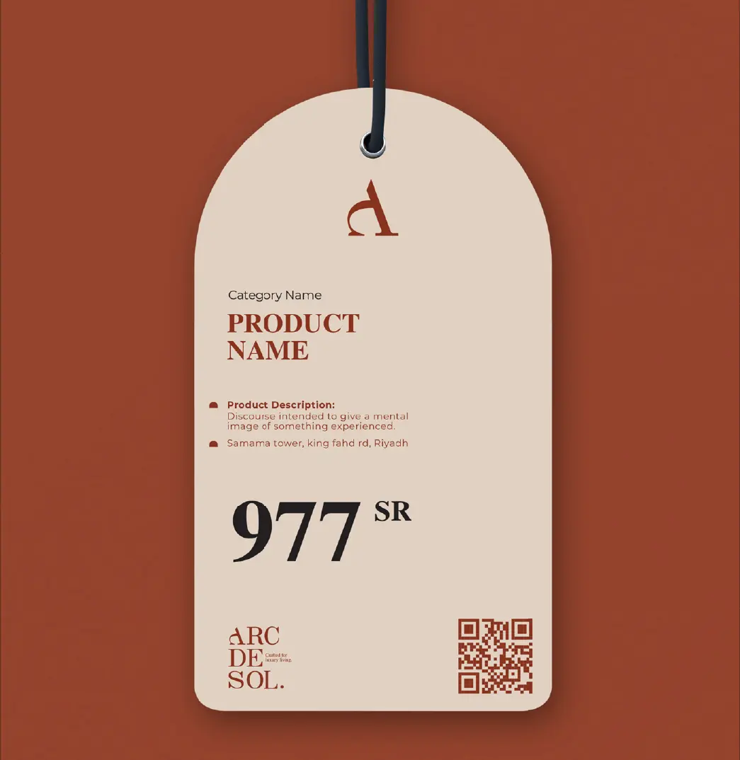 Arched Arc de Sol price tag in stone and red with product name, price in riyals and a QR code