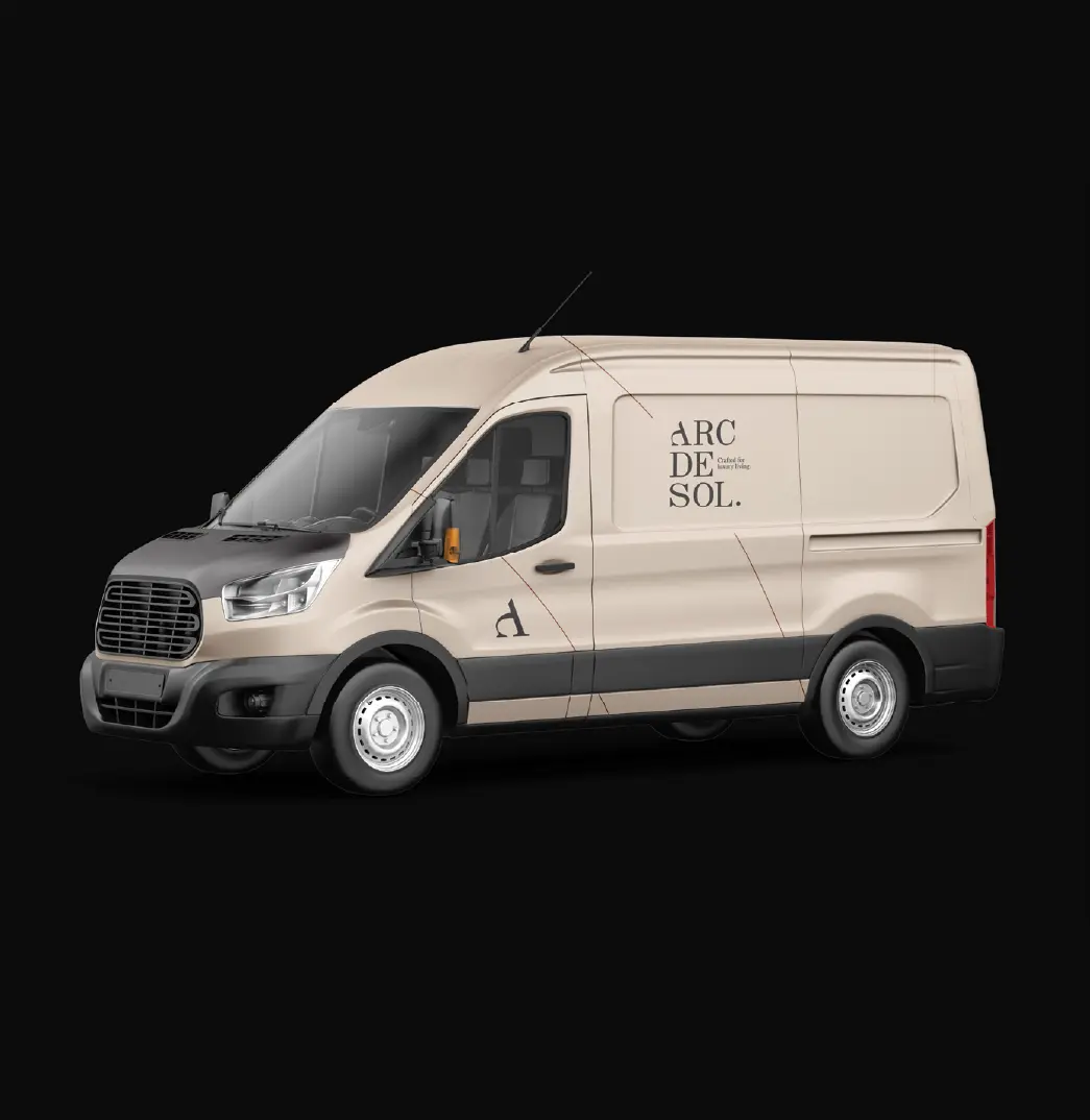Arc de Sol delivery van in a stone livery with the stacked logo and letter mark