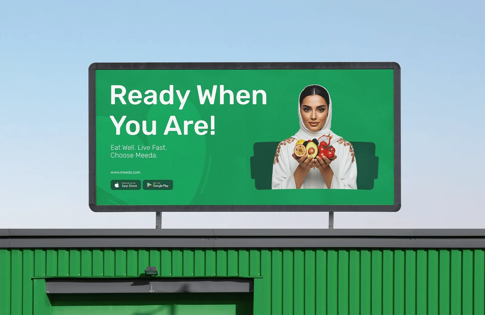 Woman holding a green Meeda branded shopping bag